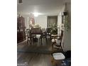 Open concept dining room with hardwood floors at 1331 Woodstone Trce, Morrow, GA 30260