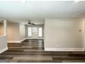 Bright living room featuring new floors, neutral paint and recessed lighting at 3456 Glensford Dr, Decatur, GA 30032