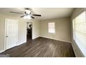 Spacious living room featuring sleek flooring, neutral walls, and a ceiling fan at 2155 Meador Se Ave, Atlanta, GA 30315