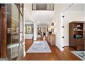 Grand foyer with hardwood floors, high ceilings, and elegant staircase leading to the upper level at 2358 New Salem Trce, Marietta, GA 30064