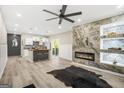 Open living area featuring fireplace, unique accents and flowing floor plan at 1766 Ware Ave, East Point, GA 30344