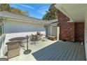 Outdoor deck space perfect for relaxing or entertaining guests, with ample seating at 1092 E Lake Rd, Mcdonough, GA 30252