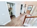 Inviting foyer featuring wood-look floors and decorative accents at 515 Sherwin Ct, Mcdonough, GA 30252
