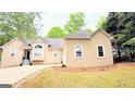 Beautiful exterior view of this ranch home that includes an attached two car garage at 1252 Heritage Dr, Villa Rica, GA 30180