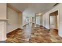 Spacious living room featuring durable flooring and ample natural light creating an inviting atmosphere at 1162 Ida Woods Ln # 23, Lawrenceville, GA 30045