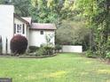 Spacious backyard with a privacy fence, perfect for outdoor activities and relaxation at 15 Perthshire Dr, Peachtree City, GA 30269
