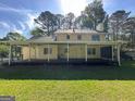 Expansive backyard featuring a large deck, perfect for outdoor entertaining at 140 Julie Rd, Tyrone, GA 30290