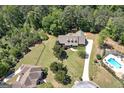 Expansive property with a well-maintained lawn, pool, and mature trees at 330 Noah Pl, Mcdonough, GA 30252