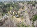 Beautiful aerial view of wooded property, showcasing home and surrounding landscape at 3935 Jailette Rd, South Fulton, GA 30349