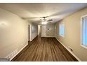 Bright living room offers wood floors, neutral walls, and natural light at 4505 Wonder Valley Trl, Decatur, GA 30034