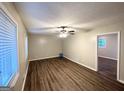 Open-concept living room boasts modern flooring, large windows, and recessed lighting for a comfortable space at 4505 Wonder Valley Trl, Decatur, GA 30034