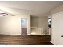 Spacious living room featuring updated flooring and neutral paint, creating a bright and inviting space at 4505 Wonder Valley Trl, Decatur, GA 30034