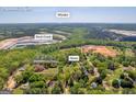 Property's location in Auburn, GA near the Rock Creek quarry at 1326 Harmony Grove Church Rd, Auburn, GA 30011