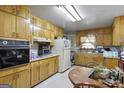 Functional kitchen with ample cabinet space and a cozy breakfast nook at 6520 Rickenbacker Cir, Morrow, GA 30260