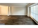 Spacious living room featuring gorgeous floors and large windows for plenty of natural light at 2578 Lavender Ct, Decatur, GA 30034