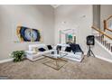 Spacious living room with high ceilings, neutral tones, and stylish decor, perfect for entertaining at 803 Baugh Springs Ln, Lawrenceville, GA 30044