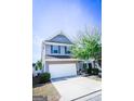 Charming two-story home featuring a two-car garage and well-maintained landscaping at 386 Hill Crest Cir, Hiram, GA 30141