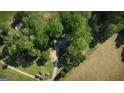Overhead view of the property, nestled among lush greenery and showcasing the vast land at 201 Little New York Rd, Carrollton, GA 30116