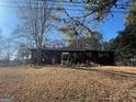 Charming one-story home with a covered front porch on a spacious lot at 5780 Hill Rd, Powder Springs, GA 30127