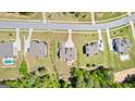 Aerial view of a well-planned neighborhood with lush lawns and tree-lined streets at 266 Blue Point Pkwy, Fayetteville, GA 30215
