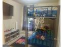 Fun bedroom with a bunk bed and a basketball hoop, providing a playful space at 6153 Oakley Rd, Union City, GA 30291