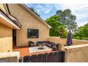Inviting outdoor patio featuring comfortable seating and a fire pit at 26 Cannongate Rd, Sharpsburg, GA 30277