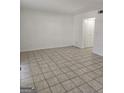 Spacious living room featuring tiled flooring and neutral paint at 3209 Abbeywood Dr, Decatur, GA 30034