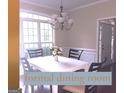Formal dining room boasting hardwood floors and large windows at 30 Cynthia Ct, Fayetteville, GA 30215