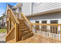 Close-up of the wooden deck, accessible by stairs, showcasing its construction at 4811 Nevilly Way, Marietta, GA 30066
