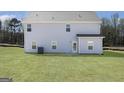 Spacious backyard with a large lawn and a view of the back of the home at 446 Cantrell Drive, Dallas, GA 30157