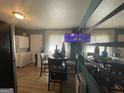 Cozy dining area featuring a round table, mirrored wall, and views of laundry and other rooms at 140 Se Mount Zion Rd # 41, Atlanta, GA 30354