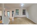Bright living room with hardwood floors and natural light at 5851 Giles Rd, Lithonia, GA 30058