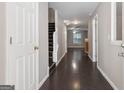 Spacious entryway with dark wood floors and a staircase, leading to the living areas of the home at 1360 Maple Valley Ct, Union City, GA 30291