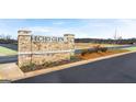Stone-clad welcome sign for Echo Glen community offers beautiful landscaping and a serene setting at 322 Sound Cir # 118, Stockbridge, GA 30281