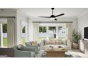 Bright living room with large windows, comfortable seating, and modern decor at 2278 Santa Fe St, Morrow, GA 30260