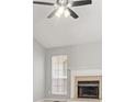 Close up of the fire place and windows in the living room at 40 Kelsey Way, Palmetto, GA 30268