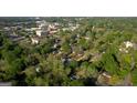 An aerial view of the neighborhood and surrounding commercial buildings at 2228 Emory Sw St, Covington, GA 30014