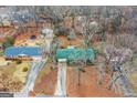 An aerial view of a lovely property with a mature landscape in a quiet neighborhood at 693 Trailwood Dr, Riverdale, GA 30274
