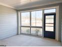 Relaxing screened patio with views of the neighborhood. Perfect for entertaining or quiet enjoyment at 3865 Shelleydale Dr # 82, Powder Springs, GA 30127