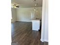 Open concept living room and kitchen with hard wood floors and modern finishes at 3706 Cheswoilde Ave # 96, Powder Springs, GA 30127
