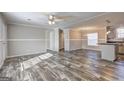 Spacious living room with modern flooring and plenty of natural light at 36 Highpoint Ln, Locust Grove, GA 30248