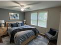 Cozy bedroom featuring a comfortable bed, soothing colors, and abundant natural light at 2691 Old South Dr, Jonesboro, GA 30236