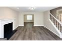 Cozy living room showcasing wood floors and a fireplace at 2717 Knollberry Ln, Decatur, GA 30034