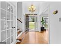 Bright foyer with hardwood floors and a view of the front yard at 195 Blackberry Run, Fayetteville, GA 30214