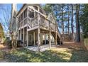 A covered outdoor area beneath a screened deck, perfect for relaxation at 5 Renfroe Ct, Decatur, GA 30030