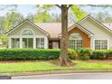 A single story home with a well manicured hedge row and brick and siding front details at 3746 Vineyards Lake Nw Cir # U6, Kennesaw, GA 30144