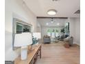 Bright living room features hardwood floors, fireplace, ceiling fan and abundant natural light at 1000 Arbor Forest Sw Way # 1000, Marietta, GA 30064