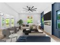 Bright living room features a modern ceiling fan, a fireplace and lots of natural light at 378 Grant Park Se Pl, Atlanta, GA 30315