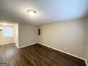 Inviting living room showcasing wood floors and neutral wall colors at 3332 Ruby H Harper Se Blvd, Atlanta, GA 30354