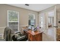Functional office space with a wooden desk, providing a quiet workspace at 2060 Lake St, Loganville, GA 30052